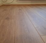 ELKA 8mm Rustic Oak Laminate Flooring supplied and installed to a living room.